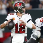 TAMPA, FL - SEPTEMBER 09: Tampa Bay Buccaneers Quarterback Tom Brady (12) looks for an open receiver during the regular