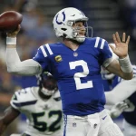 INDIANAPOLIS, IN - SEPTEMBER 12: Indianapolis Colts Quarterback Carson Wentz (2) looks down field to make a pass during