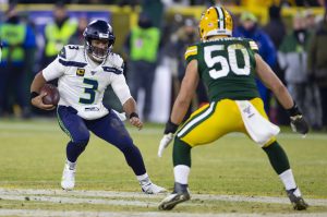 January 12, 2020: Seattle Seahawks quarterback Russell Wilson 3 looks to get around Green Bay Packer