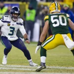 January 12, 2020: Seattle Seahawks quarterback Russell Wilson 3 looks to get around Green Bay Packer