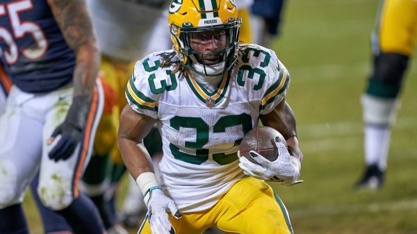CHICAGO, IL - JANUARY 03: Green Bay Packers running back Aaron Jones (33) runs with the football in action during a game