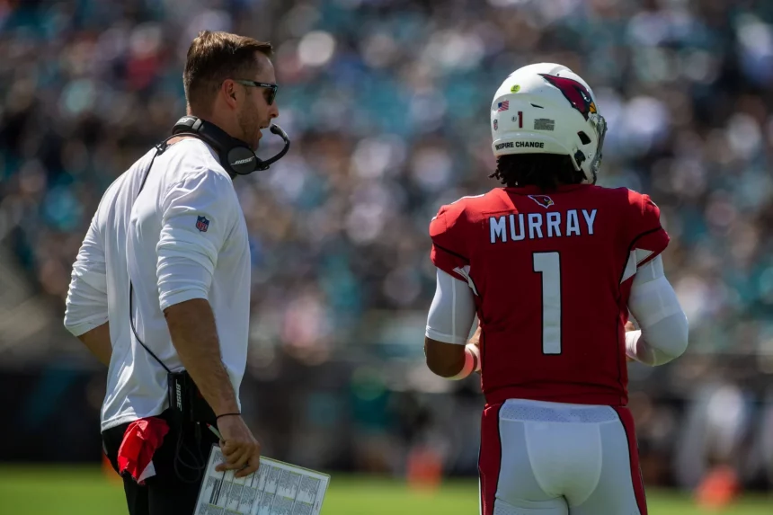 September 26, 2021, Syracuse, New York, USA: Arizona Cardinals head coach KLIFF KINGSBURY talks with Arizona Cardinals q