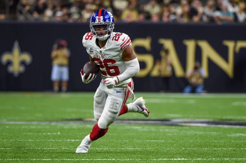 NEW ORLEANS, LA - OCTOBER 03: New York Giants running back Saquon Barkley (26) finds open field during the football game