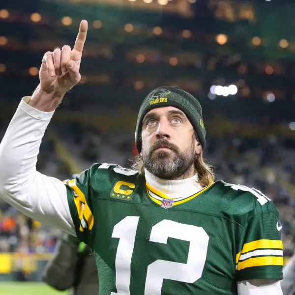 November 28, 2021: Green Bay Packers quarterback Aaron Rodgers (12) signals number 1 as he walks off the field after th