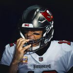CHICAGO, IL - OCTOBER 08: Tampa Bay Buccaneers Quarterback Tom Brady (12) adjusts his helmet prior to game action for a
