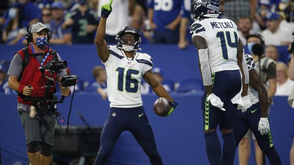 INDIANAPOLIS, IN - SEPTEMBER 12: Seattle Seahawks Wide Receiver Tyler Lockett (16) celebrates his touchdown during an NF