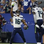 INDIANAPOLIS, IN - SEPTEMBER 12: Seattle Seahawks Wide Receiver Tyler Lockett (16) celebrates his touchdown during an NF