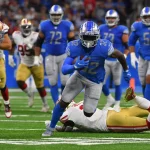 DETROIT, MI - SEPTEMBER 12: Detroit Lions running back D Andre Swift (32) accelerates after getting into the backfield d