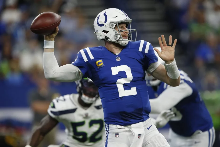INDIANAPOLIS, IN - SEPTEMBER 12: Indianapolis Colts Quarterback Carson Wentz (2) looks down field to make a pass during