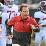 October 16, 2021: Alabama Crimson Tide head coach Nick Saban leads his team onto the field before the NCAA, College Leag