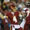 LANDOVER, MD - NOVEMBER 29: Washington Football Team quarterback Taylor Heinicke (4) throws a pass from the pocket duri
