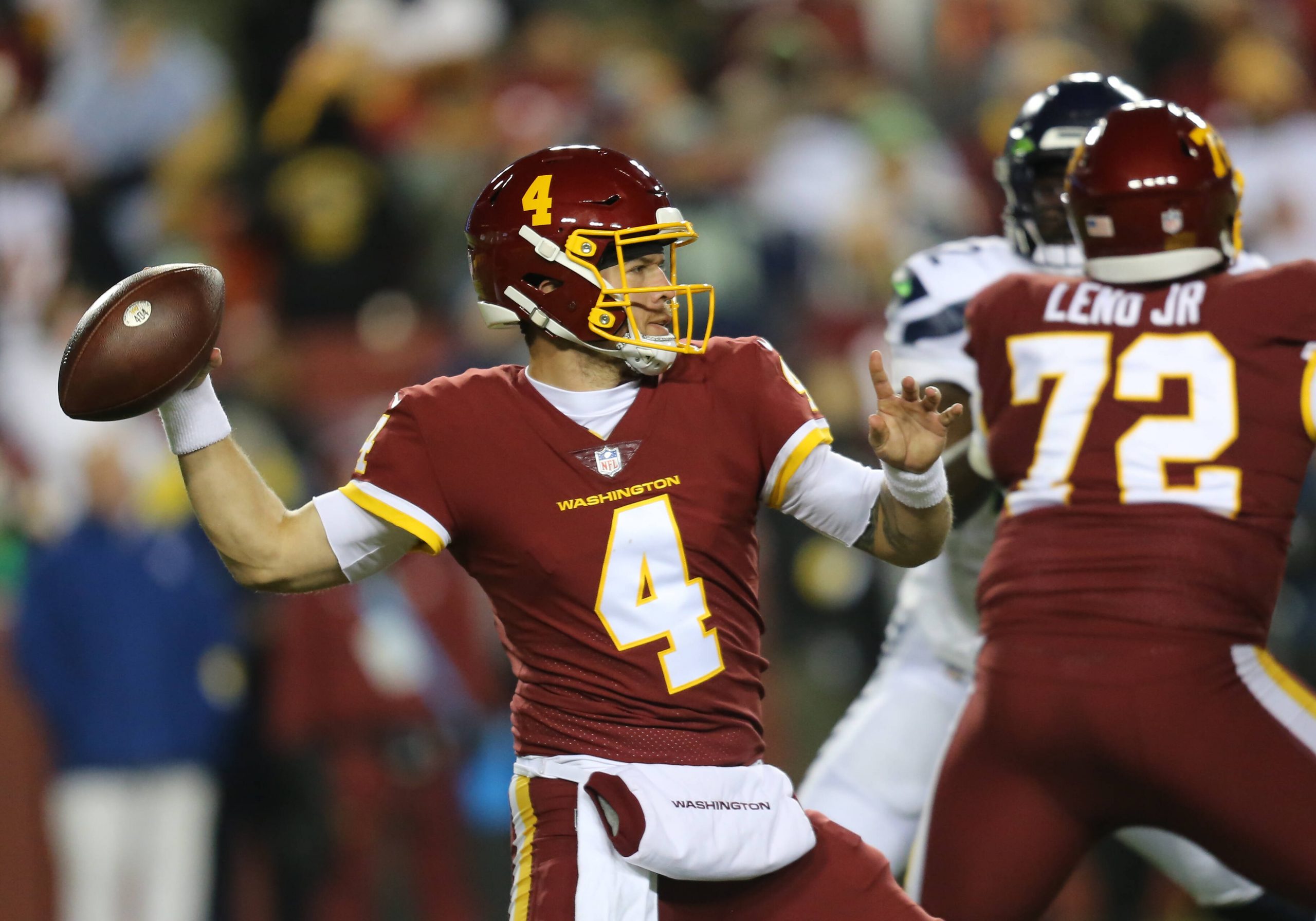 LANDOVER, MD - NOVEMBER 29: Washington Football Team quarterback Taylor Heinicke (4) throws a pass from the pocket duri