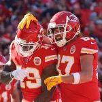 KANSAS CITY, MO - DECEMBER 12: Kansas City Chiefs tight end Travis Kelce (87) celebrates with wide receiver Josh Gordon