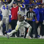 GLENDALE, AZ - DECEMBER 13 Los Angeles Rams wide receiver Odell Beckham Jr. 3 runs for a first down during the Los Angel