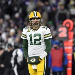 BALTIMORE, MD - DECEMBER 19: Packers quarterback Aaron Rodgers (12) looks up at the scoreboard during the Green Bay Pack