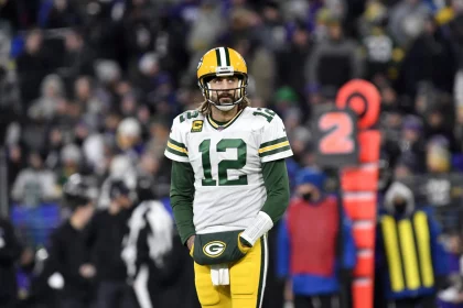 BALTIMORE, MD - DECEMBER 19: Packers quarterback Aaron Rodgers (12) looks up at the scoreboard during the Green Bay Pack