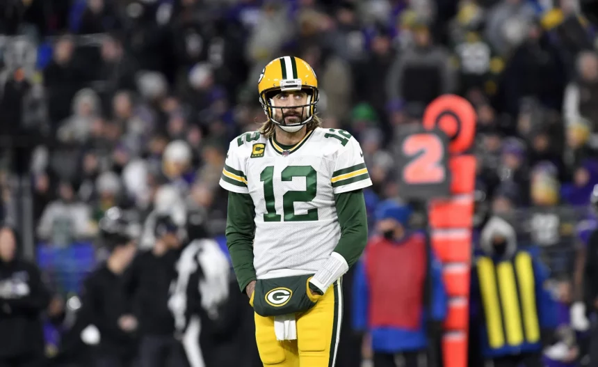 BALTIMORE, MD - DECEMBER 19: Packers quarterback Aaron Rodgers (12) looks up at the scoreboard during the Green Bay Pack