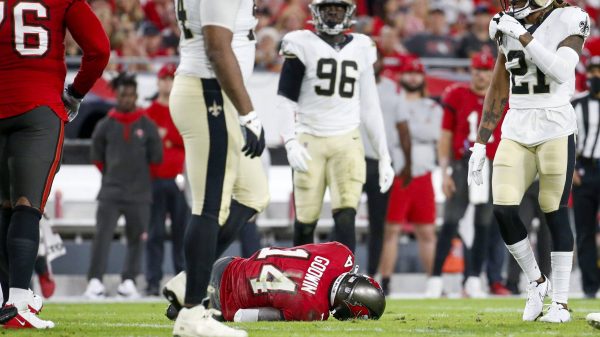 December 19, 2021, Tampa, Florida, USA: Tampa Bay Buccaneers wide receiver Chris Godwin (14) is seen on the ground after