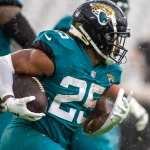 December 19, 2021, Jacksonville, Florida, USA: Jacksonville Jaguars running back JAMES ROBINSON (25) races upfield in th