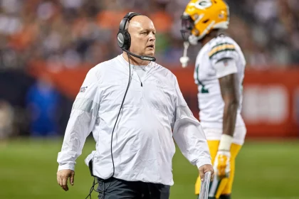 CHICAGO IL SEPTEMBER 05 Green Bay Packers offensive coordinator Nathaniel Hackett talks into his