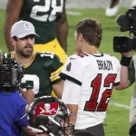 October 18, 2020, Tampa, Florida, USA: Green Bay Packers quarterback Aaron Rodgers (12), left, talks with Tampa Bay Buc
