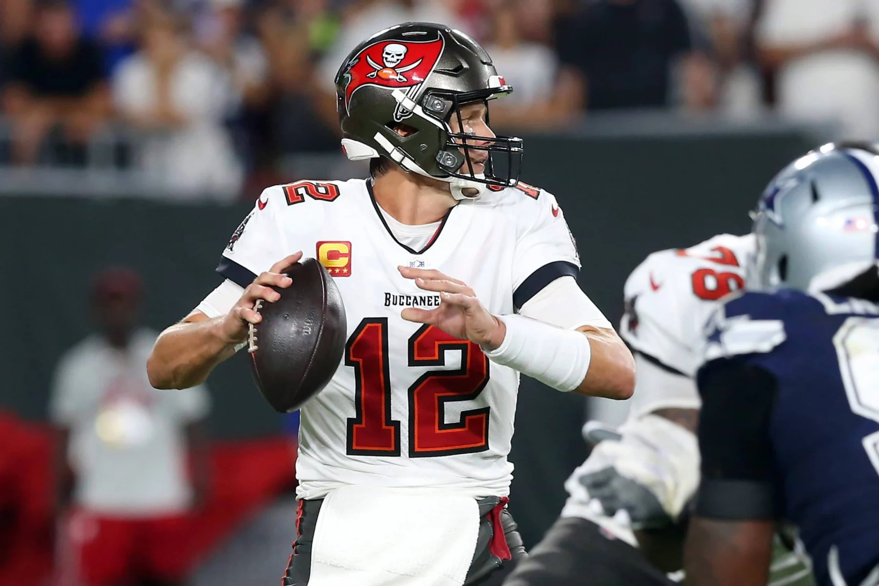 TAMPA, FL - SEPTEMBER 09: Tampa Bay Buccaneers Quarterback Tom Brady (12) looks for an open receiver during the regular