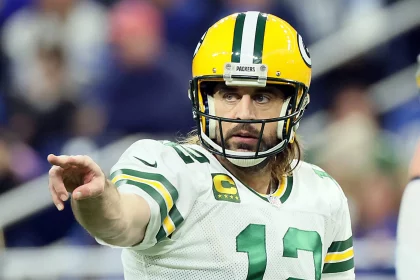 Green Bay Packers vs Detroit Lions Green Bay Packers quarterback Aaron Rodgers (12) signals before a play during an NFL,