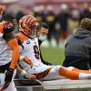 LANDOVER, MD - NOVEMBER 22: Joe Burrow (9) reacts as he is carted off the field after being injured during the Cincinna