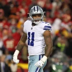 KANSAS CITY, MO - NOVEMBER 21: Dallas Cowboys outside linebacker Micah Parsons (11) flexes after a sack in the fourth qu