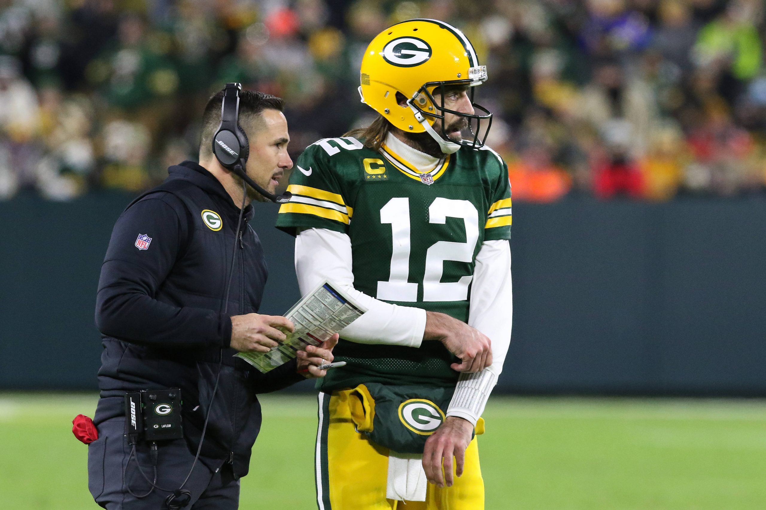 GREEN BAY, WI - NOVEMBER 28: Green Bay Packers quarterback Aaron Rodgers (12) and Green Bay Packers head coach Matt LaFl