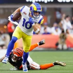 Los Angeles Rams wide receiver Cooper Kupp (10) dodges a Cincinnati Bengals defender on a 20-yard reception in the first