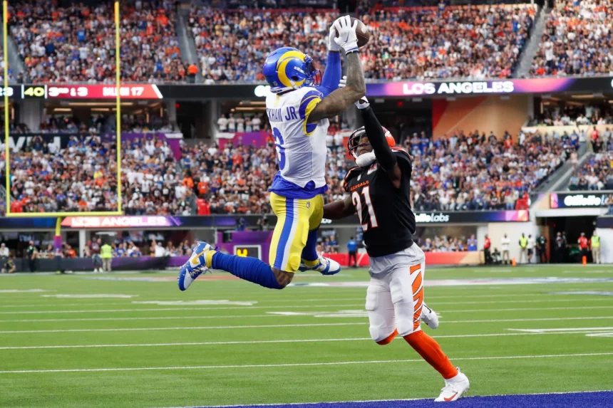 Los Angeles Rams wide receiver Odell Beckham Jr. (3) pulls in a 17-yard touchdown reception while covered by Cincinnati