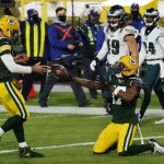 Aaron Rodgers KW49 GREEN BAY, WI - DECEMBER 06: Green Bay Packers wide receiver Davante Adams (17) hands the