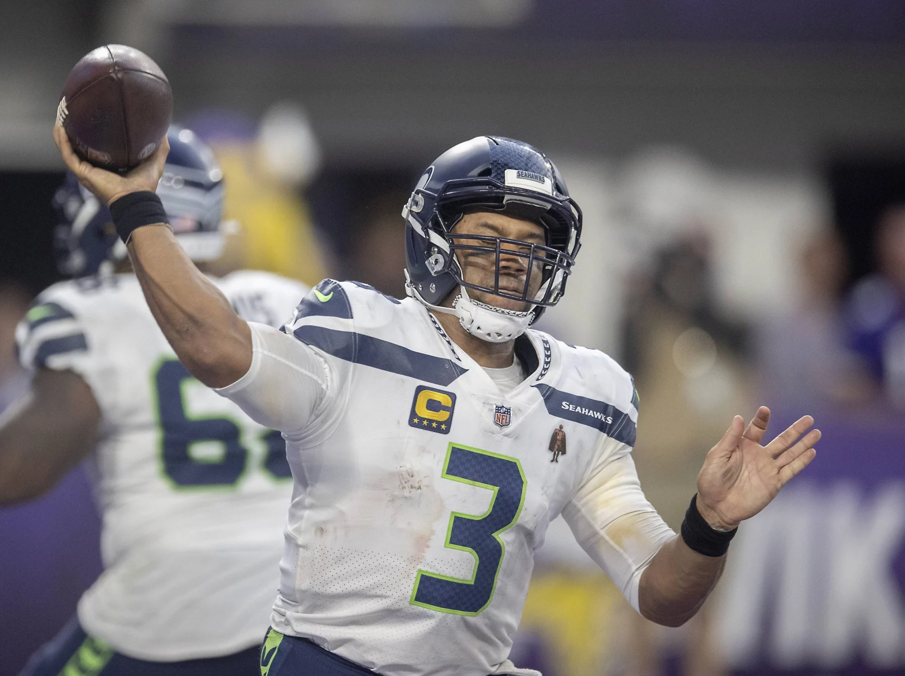September 26, 2021, Minneapolis, MN, USA - United States: Seattle Seahawks quarterback Russell Wilson (3) passes in the