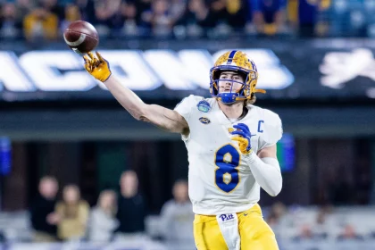 December 4, 2021: Pittsburgh Panthers quarterback Kenny Pickett 8 throws on the run during the third quarter against the Wake Forest Demon Deacons in the ACC Championship at Bank of America Stadium in Charlotte, NC. /Cal Media Charlotte United States - ZUMAc04_ 20211204_zaf_c04_335 Copyright: xScottxKinserx
