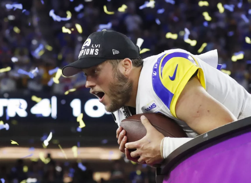 Cap Space - Los Angeles Rams quarterback Matthew Stafford holds a football while celebrating after the Rams defeat the Cincinnati Bengals in Super Bowl LVI at SoFi Stadium in Los Angeles on Sunday, February 13, 2022. The Rams defeated the Bengals 23-20. PUBLICATIONxINxGERxSUIxAUTxHUNxONLY SBP20220213948 JohnxAngelillo