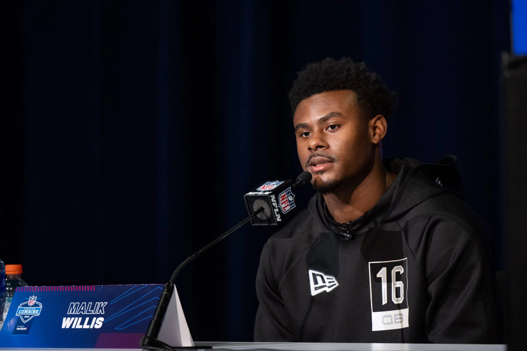 INDIANAPOLIS, IN - MARCH 02: Liberty quarterback Malik Willis answers questions from the media during the NFL, American Football Herren, USA Scouting Combine on March 2, 2022, at the Indiana Convention Center in Indianapolis, IN. Photo by Zach Bolinger/Icon Sportswire NFL: MAR 02 Scouting Combline Icon2203021160