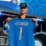 LAS VEGAS, NV - APRIL 28: Aidan Hutchinson, Michigan poses with his jersey as he is selected as the overall number two draft pick by the Detroit Lions during the NFL, American Football Herren, USA Draft on April 28, 2022 in Las Vegas, Nevada. Photo by Jeff Speer/Icon Sportswire NFL: APR 28 2022 Draft Icon2204028013