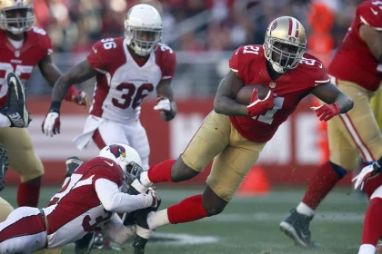 Dec. 28, 2014 - Santa Clara, CA, USA - San Francisco 49ers Frank Gore (21) is tackled at the end of a run against Arizona Cardinals Tyrann Mathieu (32) in the second quarter Sunday, Dec. 28, 2014 at Levi s Stadium in Santa Clara, Calif. The 49ers came out on top, 20-17. 49ers beat Cardinals 20-17 - ZUMAm67_