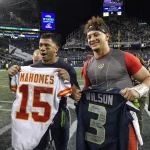 December 23, 2018 - Seattle, WA, USA - Seattle Seahawks quarterback Russell Wilson, left, and Kansas City Chiefs quarte