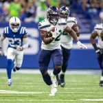 September 12, 2021: Seattle Seahawks running back Chris Carson 32 runs with the ball during NFL, American Football Herren, USA football game action between the Seattle Seahawks and the Indianapolis Colts at Lucas Oil Stadium in Indianapolis, Indiana. Seattle defeated Indianapolis 28-16. /CSM. USA - ZUMAc04_ 20210912_zaf_c04_631 Copyright: xJohnxMersitsx