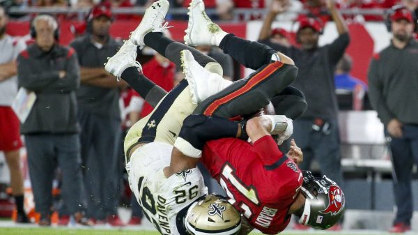 December 19, 2021, Tampa, Florida, USA: Tampa Bay Buccaneers quarterback Tom Brady 12 is sacked by New Orleans Saints defensive end Marcus Davenport 92 during the second quarter Sunday, Dec. 19, 2021 in Tampa. Tampa USA - ZUMAs70_ 0145597238st Copyright: xIvyxCeballox