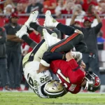 December 19, 2021, Tampa, Florida, USA: Tampa Bay Buccaneers quarterback Tom Brady 12 is sacked by New Orleans Saints defensive end Marcus Davenport 92 during the second quarter Sunday, Dec. 19, 2021 in Tampa. Tampa USA - ZUMAs70_ 0145597238st Copyright: xIvyxCeballox