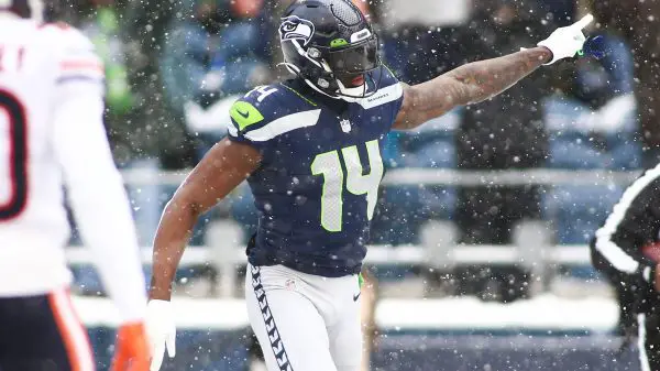 December 26, 2021: Seattle Seahawks wide receiver DK Metcalf 14 celebrates a catch for a touchdown during a game between the Chicago Bears and Seattle Seahawks at Lumen Field in Seattle, WA. The Bears won 25-24. /CSM Seattle United States of America - ZUMAc04_ 20211226_zaf_c04_233 Copyright: xSeanxBrownx