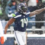 December 26, 2021: Seattle Seahawks wide receiver DK Metcalf 14 celebrates a catch for a touchdown during a game between the Chicago Bears and Seattle Seahawks at Lumen Field in Seattle, WA. The Bears won 25-24. /CSM Seattle United States of America - ZUMAc04_ 20211226_zaf_c04_233 Copyright: xSeanxBrownx
