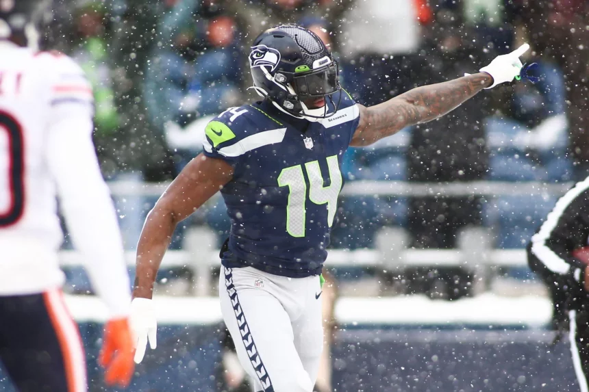 December 26, 2021: Seattle Seahawks wide receiver DK Metcalf 14 celebrates a catch for a touchdown during a game between the Chicago Bears and Seattle Seahawks at Lumen Field in Seattle, WA. The Bears won 25-24. /CSM Seattle United States of America - ZUMAc04_ 20211226_zaf_c04_233 Copyright: xSeanxBrownx