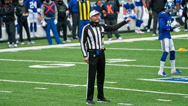 EAST RUTHERFORD, NJ - NOVEMBER 15: Referee Clay Martin (19) makes a call during the game between the Philadelphia Eagles