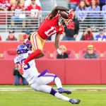 Sport Bilder des Tages SANTA CLARA, CA - NOVEMBER 28: Minnesota Vikings free safety Xavier Woods 23 trips up San Francisco 49ers wide receiver Brandon Aiyuk 11 on a 2nd down run play during the game between the Minnesota Vikings and the San Francisco 49ers on Sunday, November 28, 2021 at Levi s Stadium in Santa Clara, California. Photo by Douglas Stringer/Icon Sportswire NFL, American Football Herren, USA NOV 28 Vikings at 49ers Icon211128002