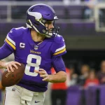 MINNEAPOLIS, MN - DECEMBER 26: Minnesota Vikings Quarterback Kirk Cousins 8 looks to pass during a game between the Minnesota Vikings and Los Angeles Rams on December 26, 2021, at U.S. Bank Stadium in Minneapolis, MN.Photo by Nick Wosika/Icon Sportswire NFL, American Football Herren, USA DEC 26 Rams at Vikings Icon2021122610