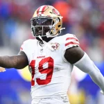 FootballR - NFL 49ers dominieren - Deebo Samuel von den San Francisco 49ers, feiert während eines Spiels.